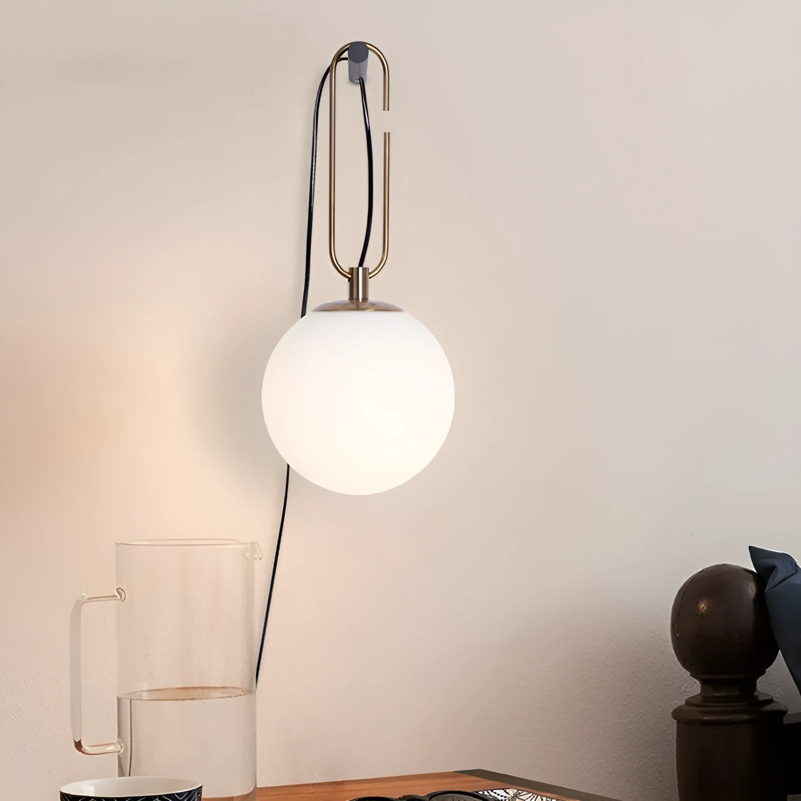 Clear glass Nordic wall lamp with three light colour options on white wall