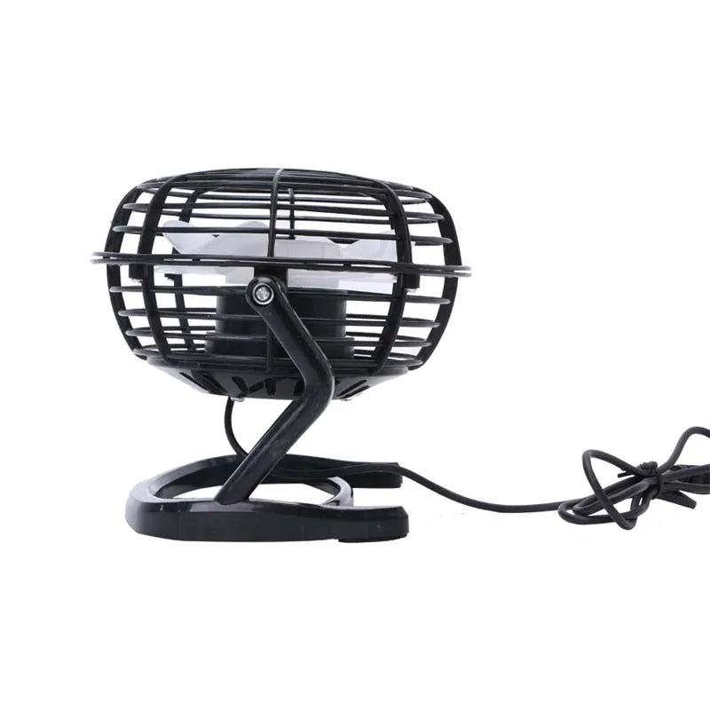 Compact black mini USB desk fan with adjustable tilt head on a wooden desk.
