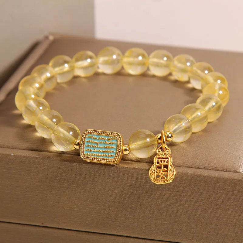 Women's natural citrine crystal bracelet with rhinestone decorative elements