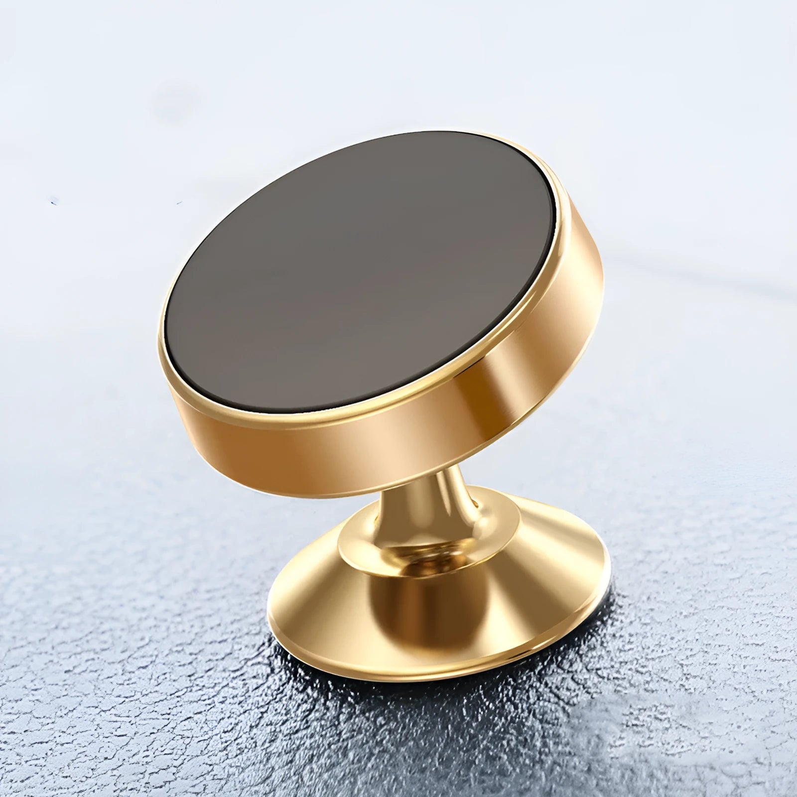 Aluminium alloy magnetic car phone holder in black, gold, or silver with paste or snap mounting.