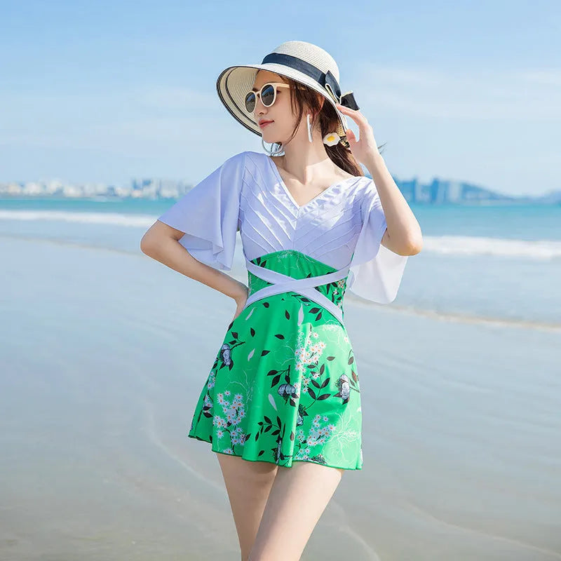 Women's green printed one-piece chemical fibre swimsuit showing front design