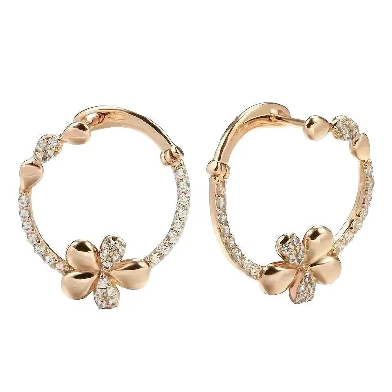 A pair of women's round geometric ring earrings in copper with an electroplated EK13286-FD-01 colour finish.