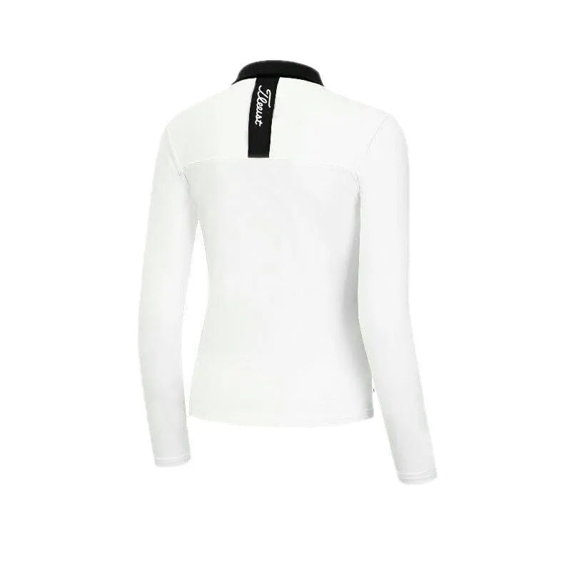 Women's white golf top with long sleeves for sun protection during outdoor activities