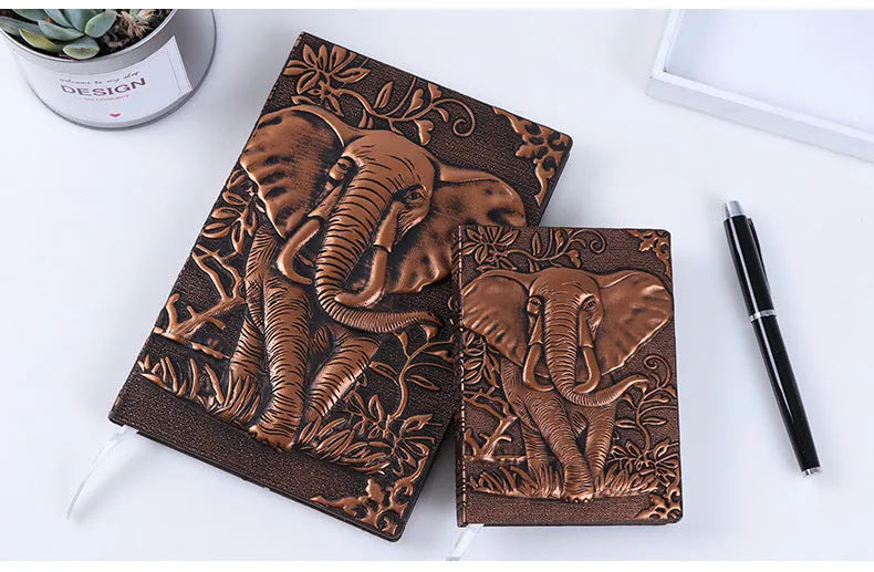 PU leather A5 notebook with three-dimensional embossed cover and bronze highlights, open to beige pages