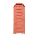 Outdoor cotton sleeping bag quilt shown in ochre and olive green colours, folded to show its ultra-light portable design.