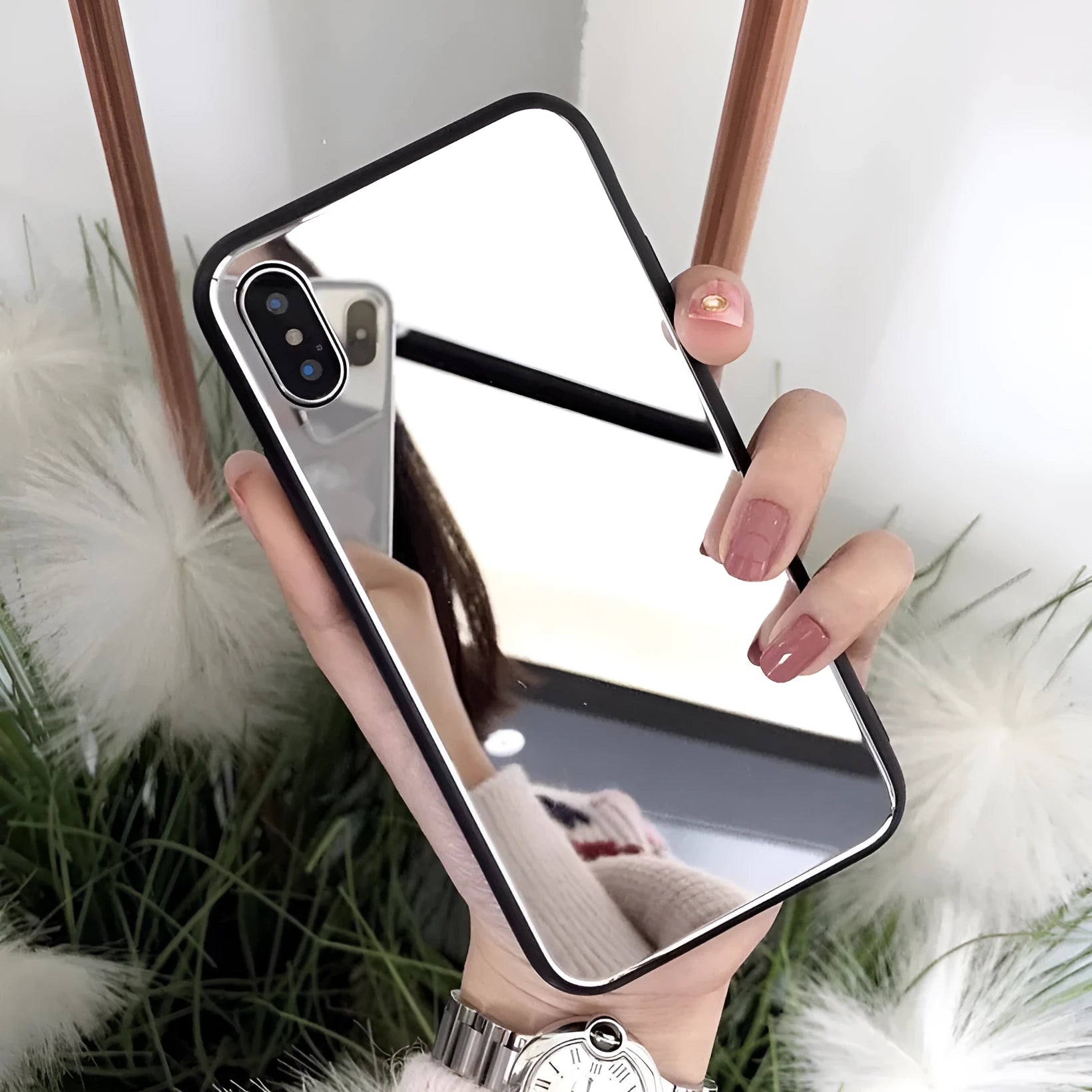 Black mirror phone case for iPhone, showing the reflective surface on the back cover.