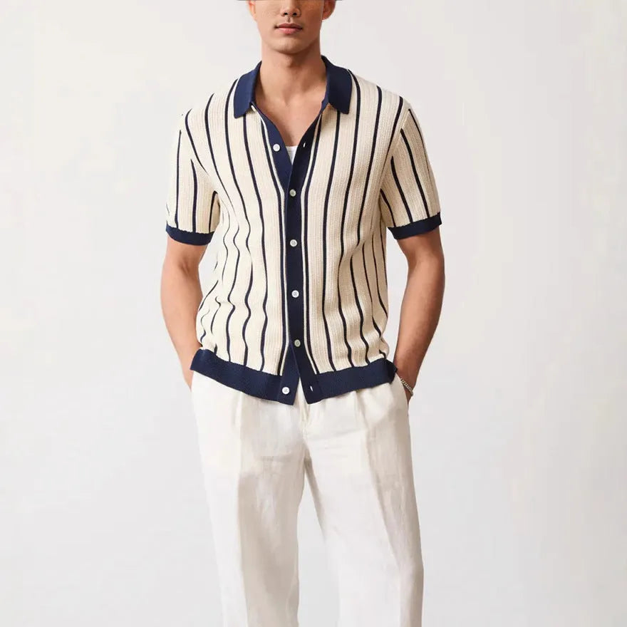 White men's short sleeve knitted shirt with asymmetric stripes and a lapel collar.