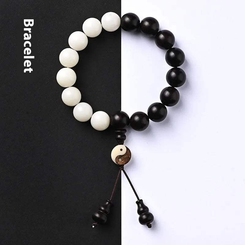 Handcrafted Bodhi bracelet with White Corypha and Blackwood eight-diagram beads