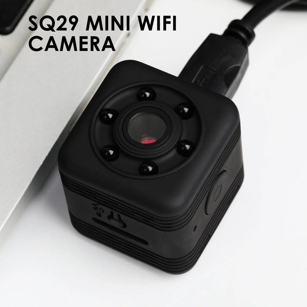 Black SQ29 waterproof sports camera shown with MicroUSB port and support for 32GB TF cards.