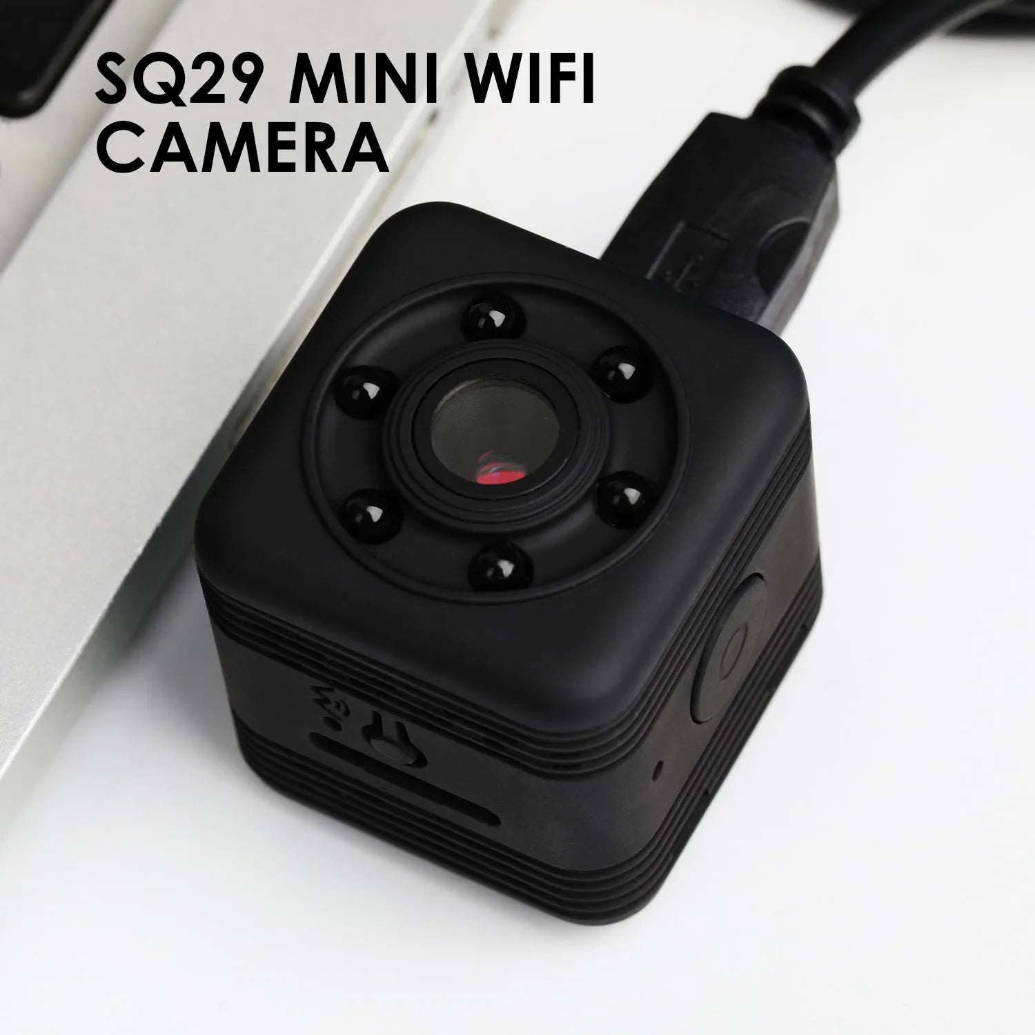 Black SQ29 waterproof sports camera shown with MicroUSB port and support for 32GB TF cards.