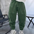 Men's loose-fit cropped trousers in bamboo fibre, shown in army green colour