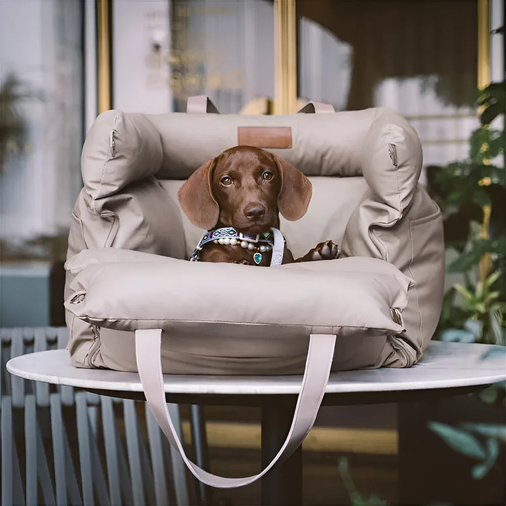 Green waterproof dog car nest bed with sides, showing removable design for washing, placed in a car boot.
