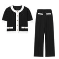 Women's two-piece polyester suit with beaded leather detail on top and high-waisted trousers