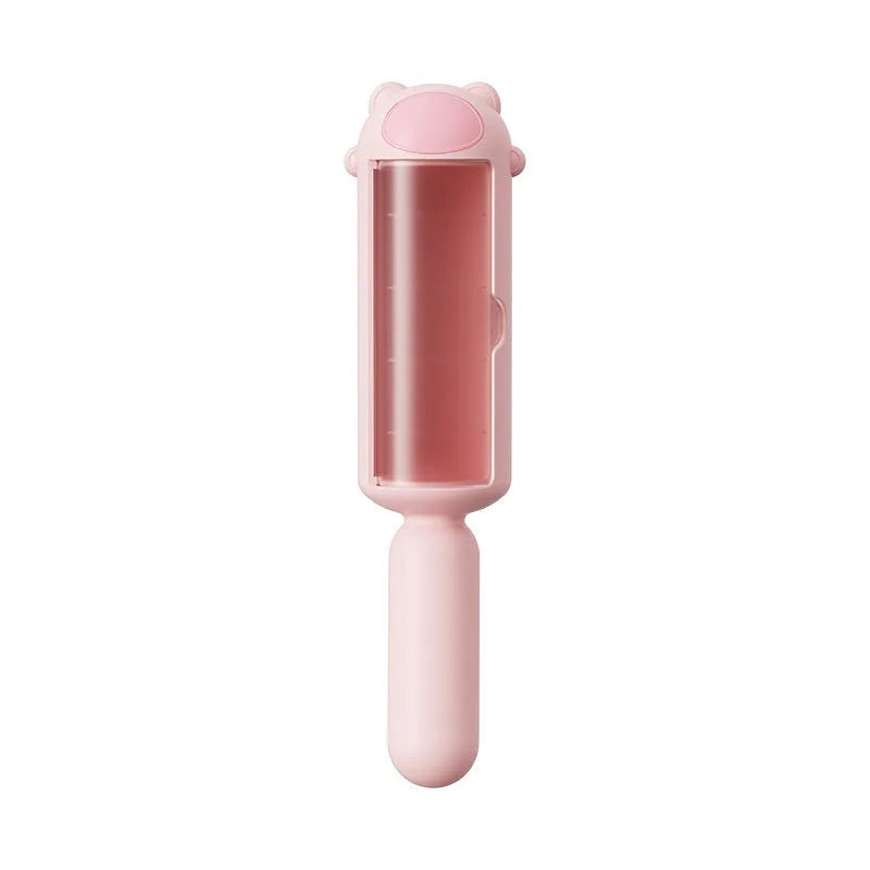 Blue reusable pet hair remover tool with self-cleaning base for furniture and cars