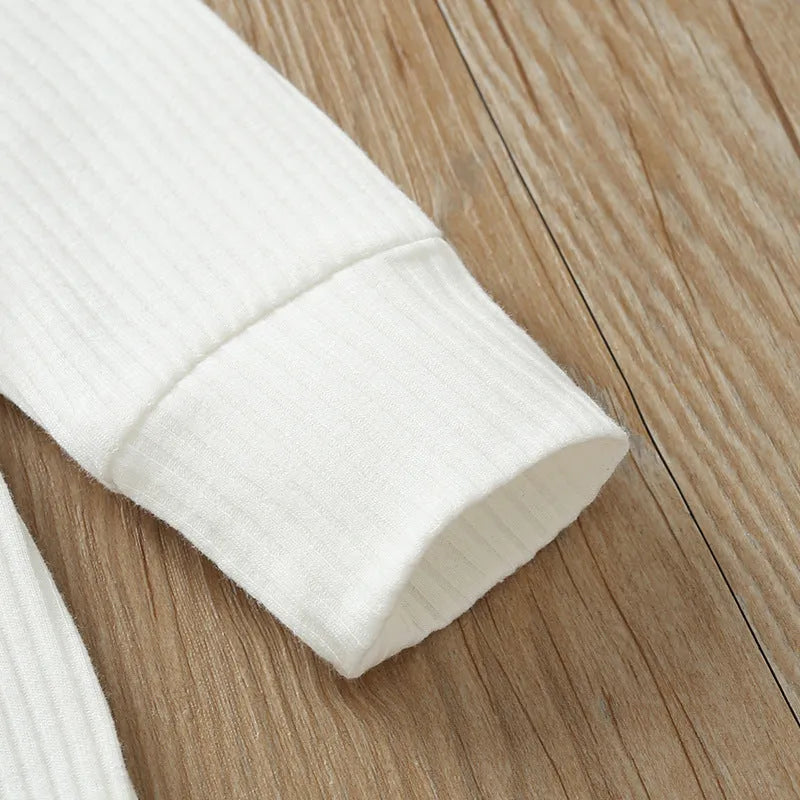 Baby cotton jumpsuit with snap closure long sleeves 60cm height neutral colour