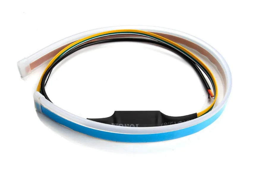60cm ultra-thin car LED tear light guide strip in white yellow two-colour mode on a dark background