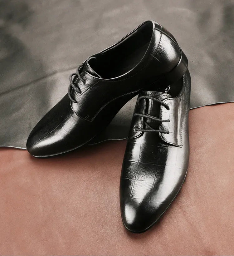 Men's black checkered derby leather shoes with a pointed toe and rubber sole.