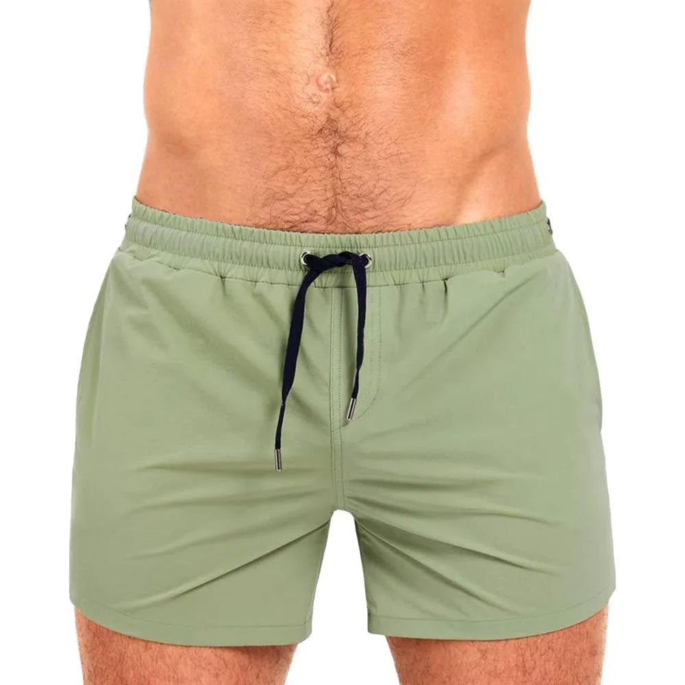 Men's solid colour polyester swimming shorts with mesh lining in army green