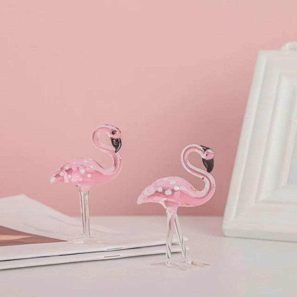 Pink flamingo crystal decorative figurine on a white base for modern home table decor.