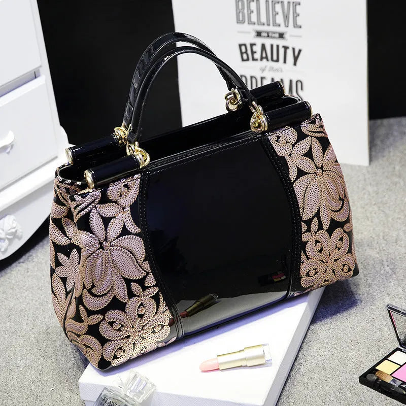 Patent leather handbag with sequin bead embroidery in blue, adjustable shoulder strap, crossbody style