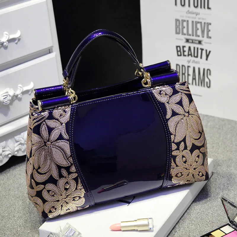 Patent leather handbag with sequin bead embroidery in blue, adjustable shoulder strap, crossbody style