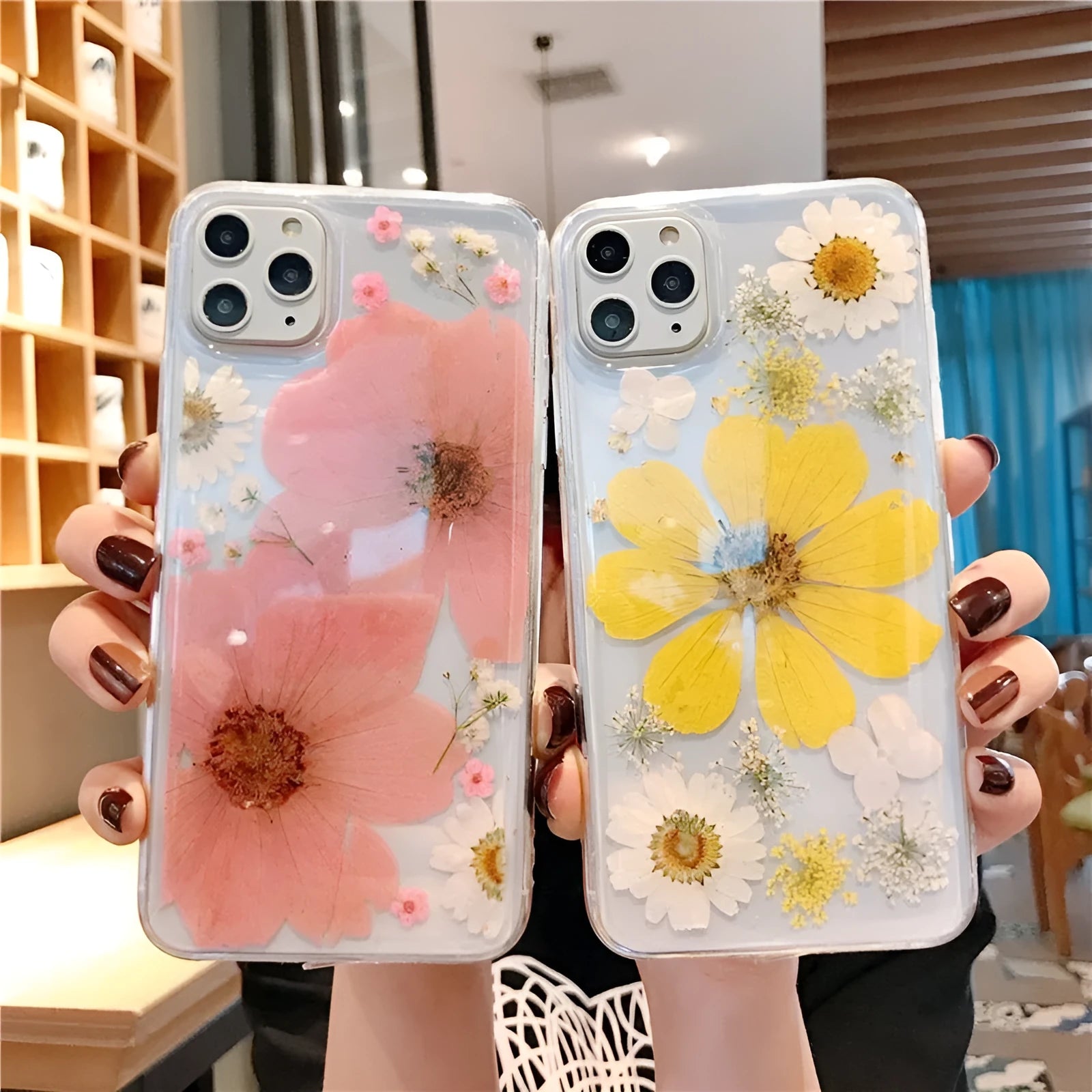 Floral iPhone case with large flower design on flexible TPU back cover in pink or yellow colour options