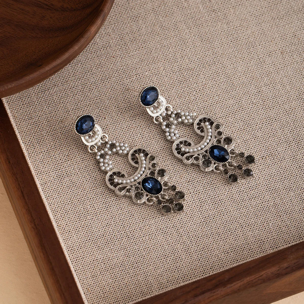 Vintage court style earrings in blue crystal with geometric chamfered square grain shape, zinc alloy and electroplated finish