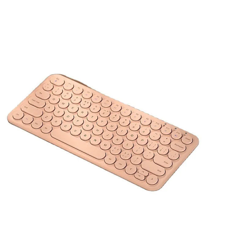 White ultra-thin wireless keyboard and mouse with USB receiver on a wooden desk