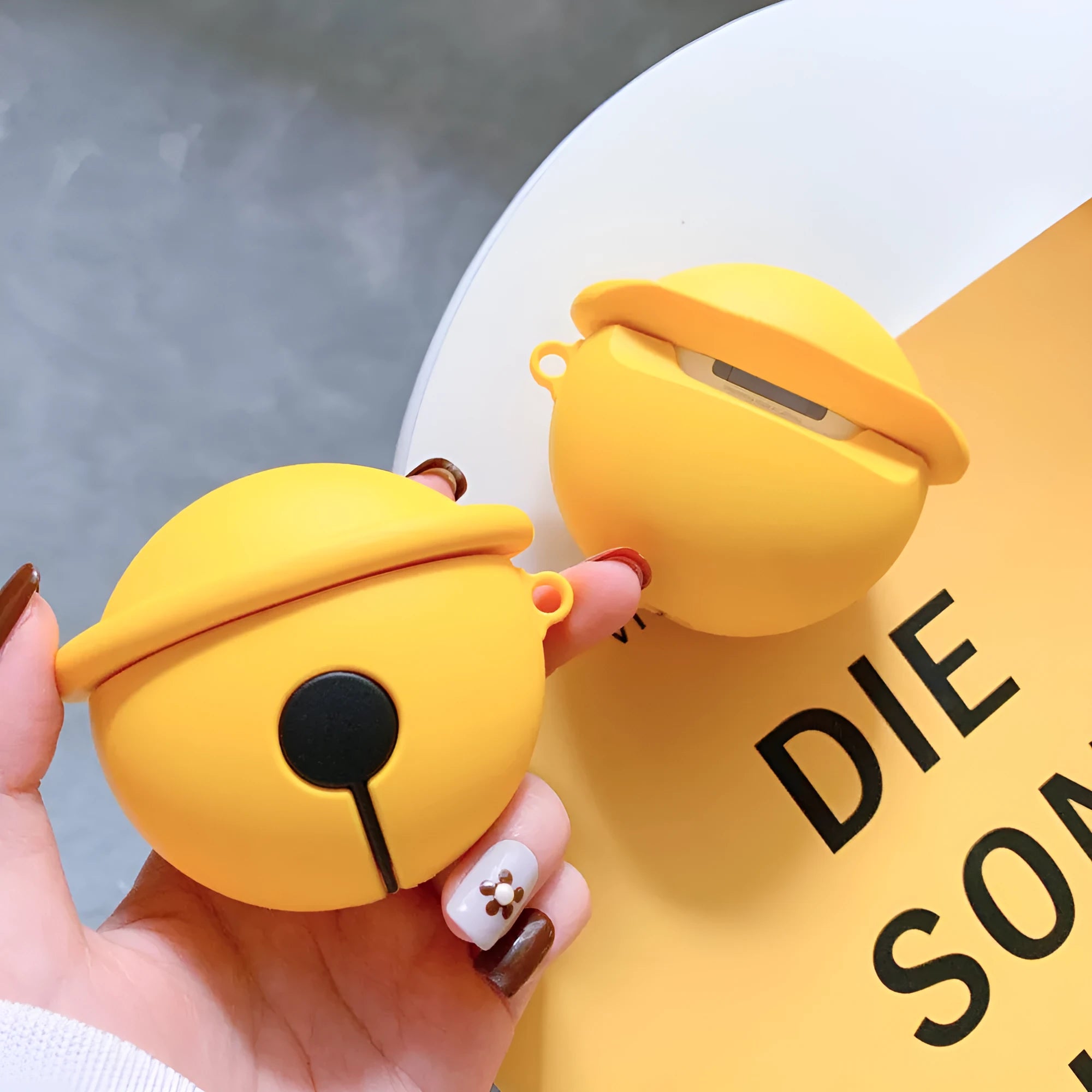 Yellow silicone bell-shaped case for AirPods 1 and 2 wireless headphones