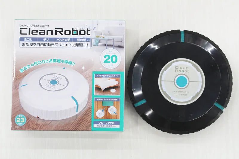 AC automatic sweeping robot vacuum cleaner in black or white on a hard floor