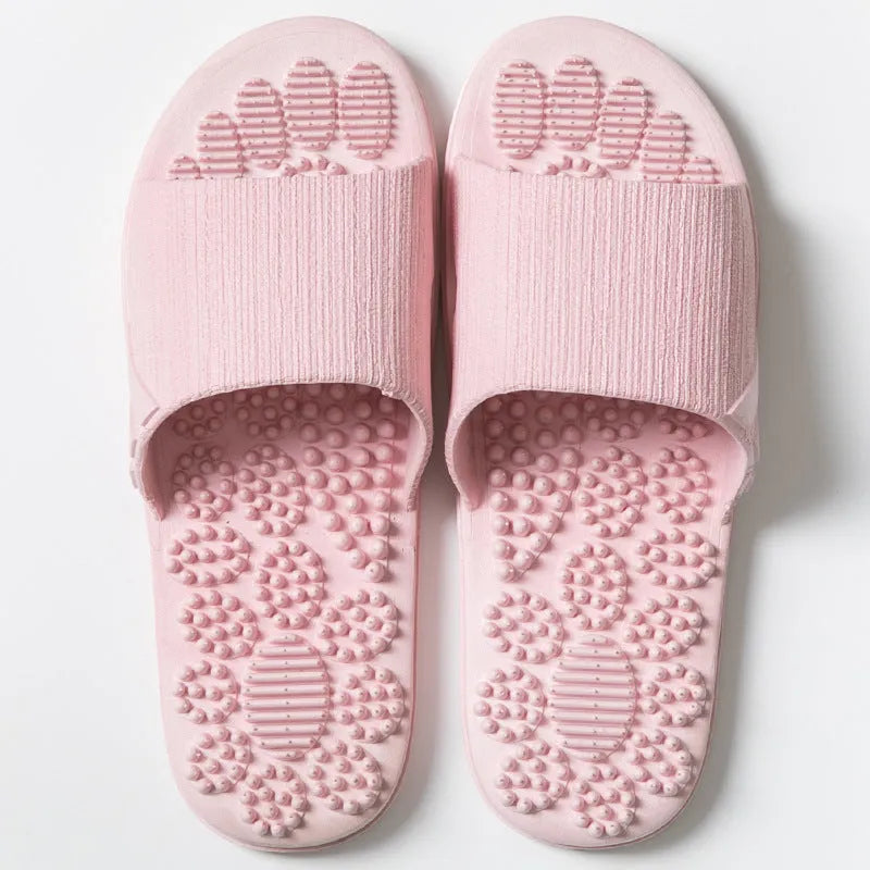 Reflexology acupressure slippers in EVA material with 3D massage particles, available in blue, grey, light blue, pink, purple