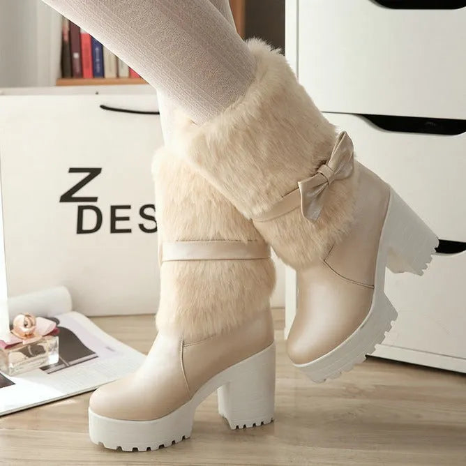 Women's thick heel snow boots in beige with chunky heel, waterproof platform, bow detail, and mid-calf shaft