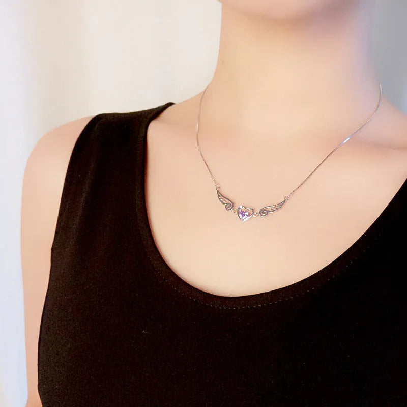 Angel wings necklace in 925 sterling silver with purple crystal heart pendant and 45cm link chain