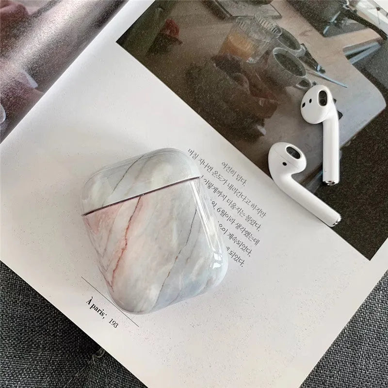 White marble-pattern hard PC protective case for Apple AirPods 1 and 2 charging box.