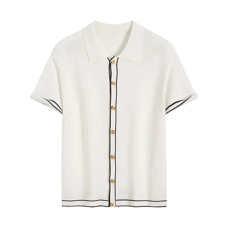 White short-sleeve cardigan with dark contrast colour lapels, buttoned front, and a relaxed fit.