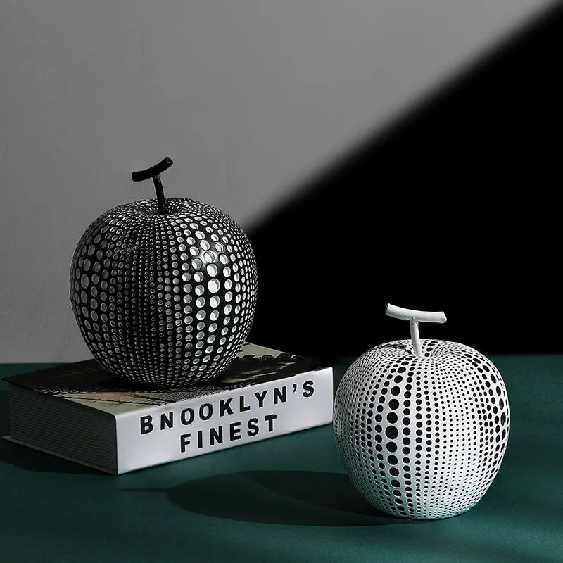 Resin apple sculpture in black, 17cm tall, smooth resin finish