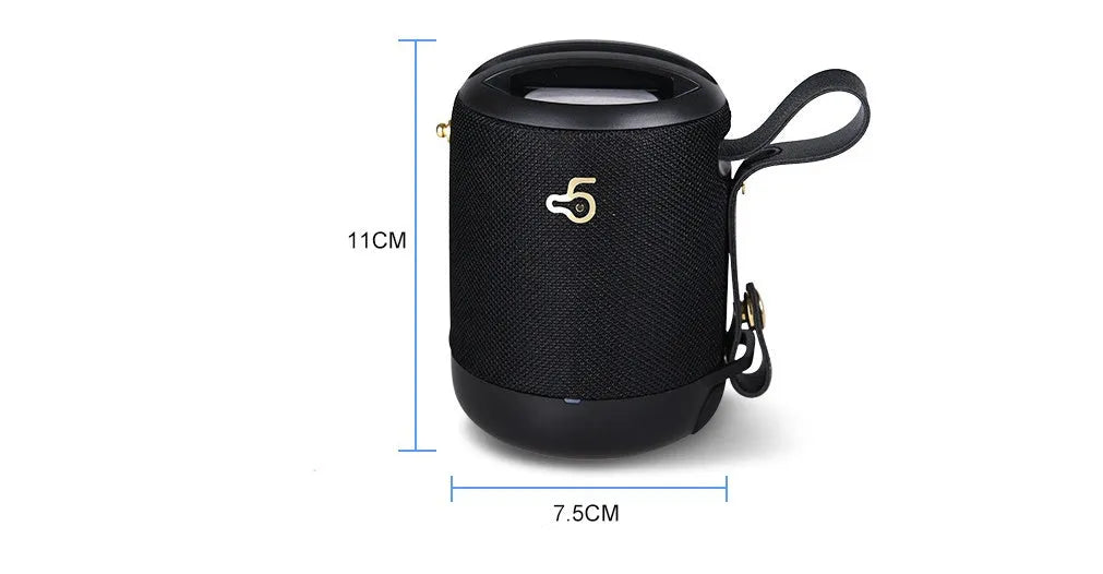 Compact black waterproof Bluetooth speaker with a carry belt, showing control buttons and a leather-style finish.