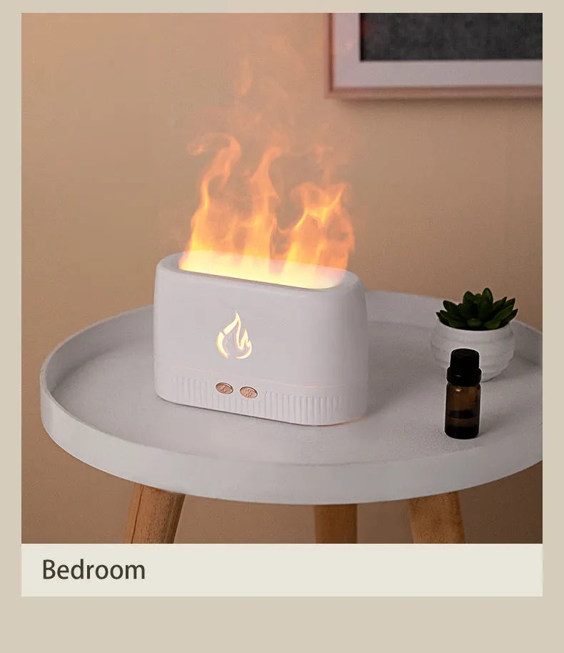 White flame aroma diffuser with 230ml tank, USB cable, on a wooden table, showing mist and flame effect
