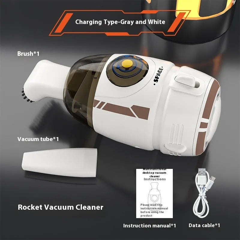 USB-powered handheld desktop vacuum cleaner in blue rocket design on a wooden desk.