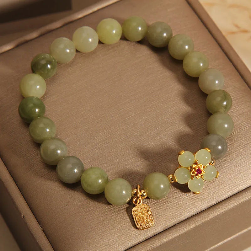 Women's alloy bracelet in grey jade colour with clasp closure for casual wear.