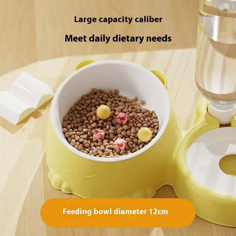 Haze blue plastic automatic pet waterer and food bowl with two compartments and a large water reservoir at the back.