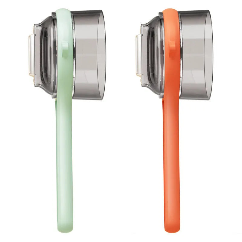 Light green kitchen peeler with integrated bucket storage for catching vegetable and fruit peels