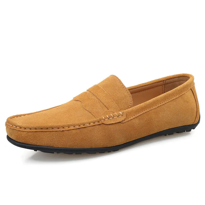 Men's solid colour suede slip-on loafers with round toe and flat heel.