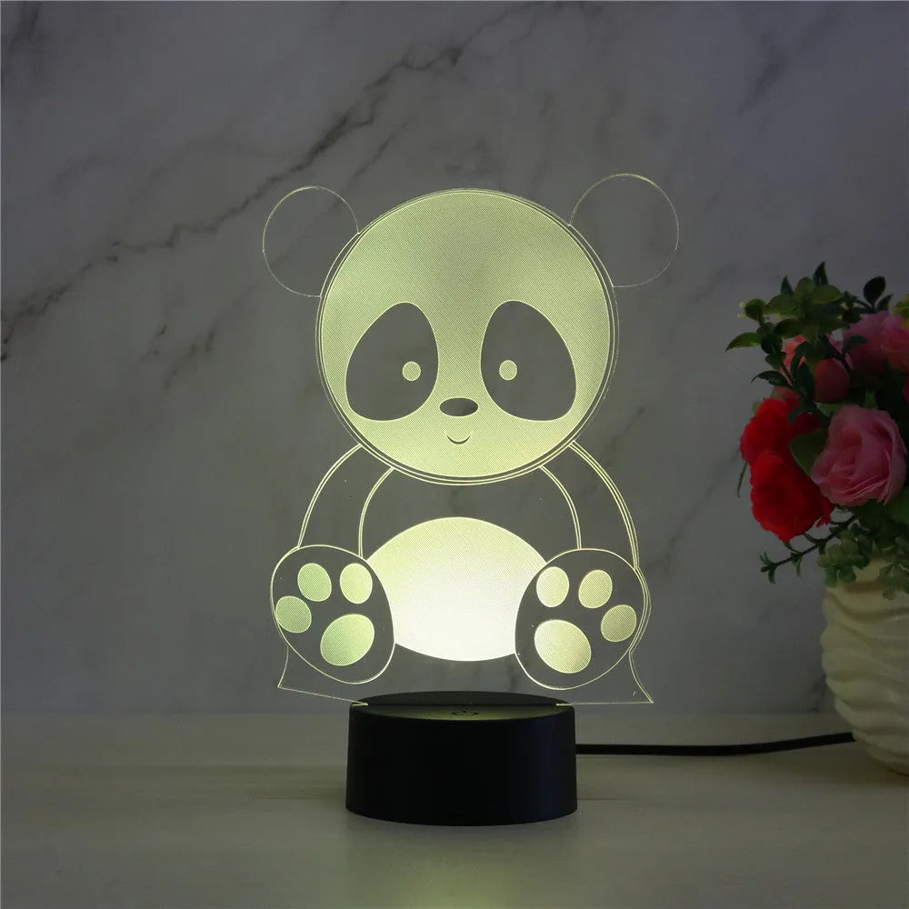 Panda shaped night light with remote control showing seven colour LED illumination