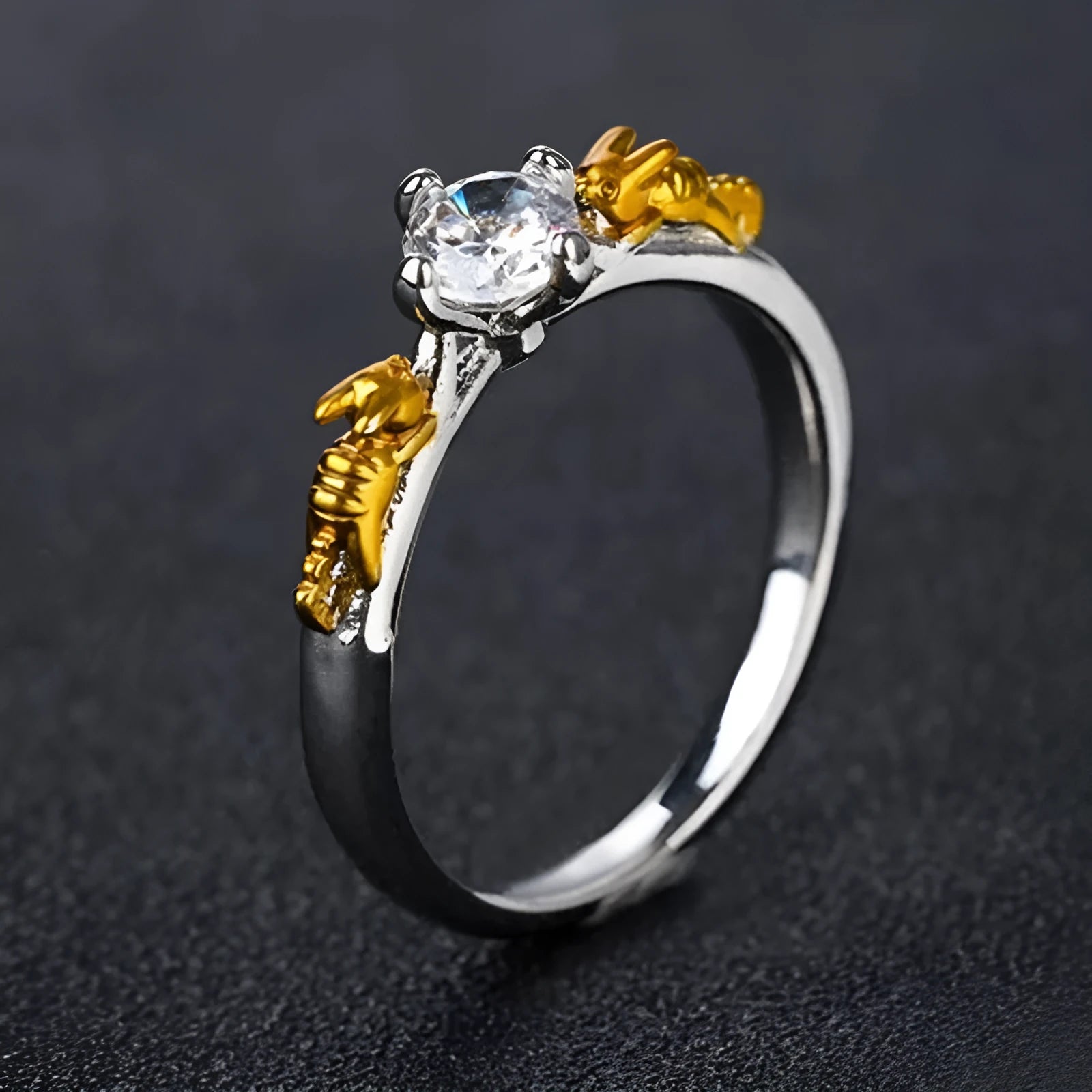 Detailed black gold copper crown ring on a finger, showing crown modelling and metallic finish.