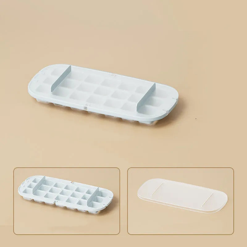 Yellow high-capacity grid ice cube tray with integrated storage slot for an ice shovel