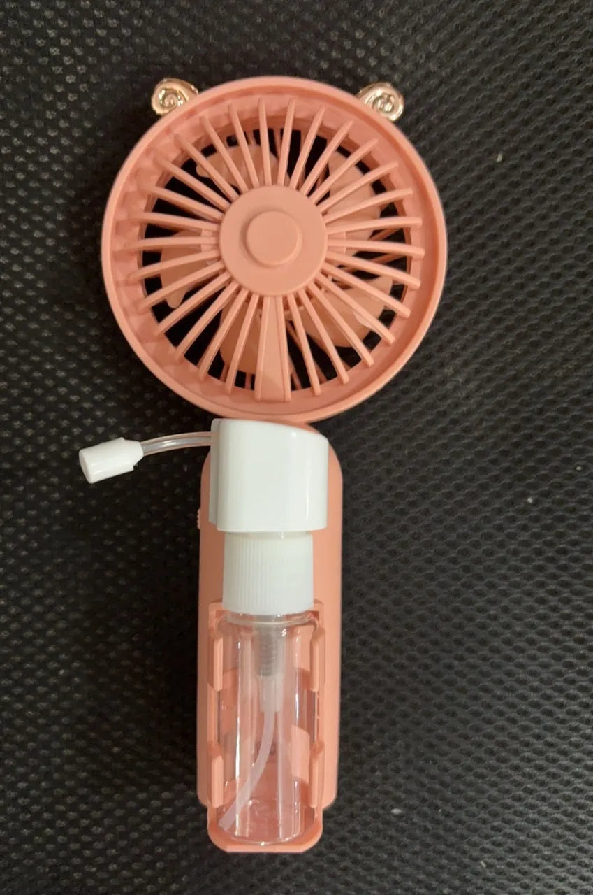 Portable plastic USB desk fan in a choice of apricot, blue, green, orange, or pink colours.