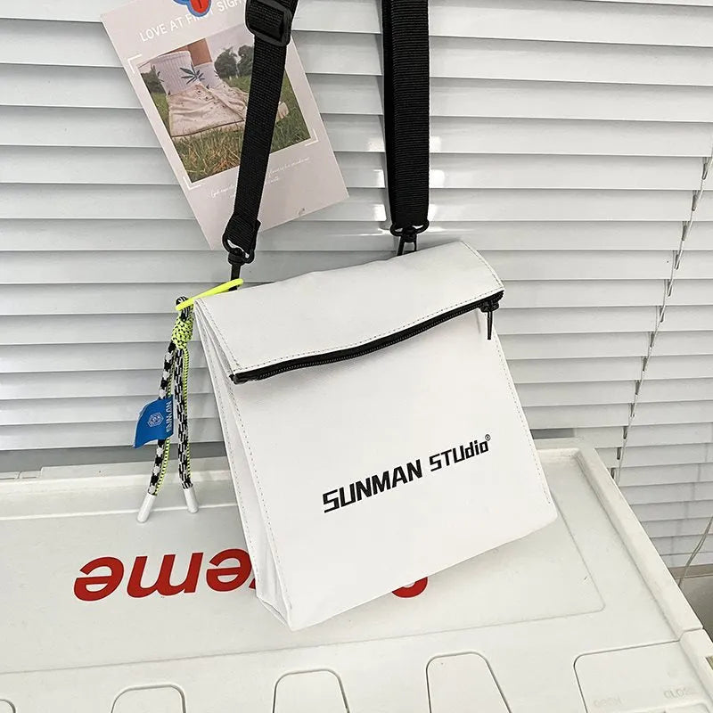 Simple all-match messenger bag backpack in polyester with adjustable crossbody strap, showing sewing line detail