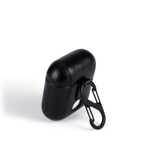 Genuine leather protective pouch for Apple Airpods charging case in black, brown, light brown, and red colours.
