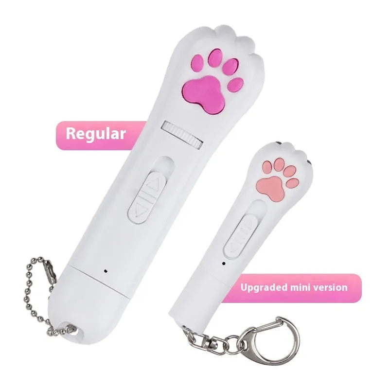 USB-rechargeable infrared laser cat toy wand in pink, projecting a cat footprints laser pattern on a floor.